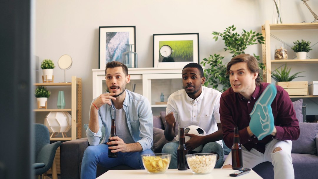 group watching tv together